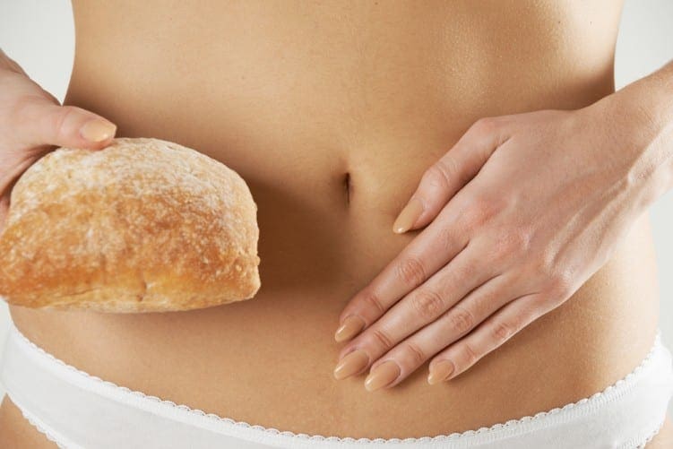 Coeliac disease woman with bread